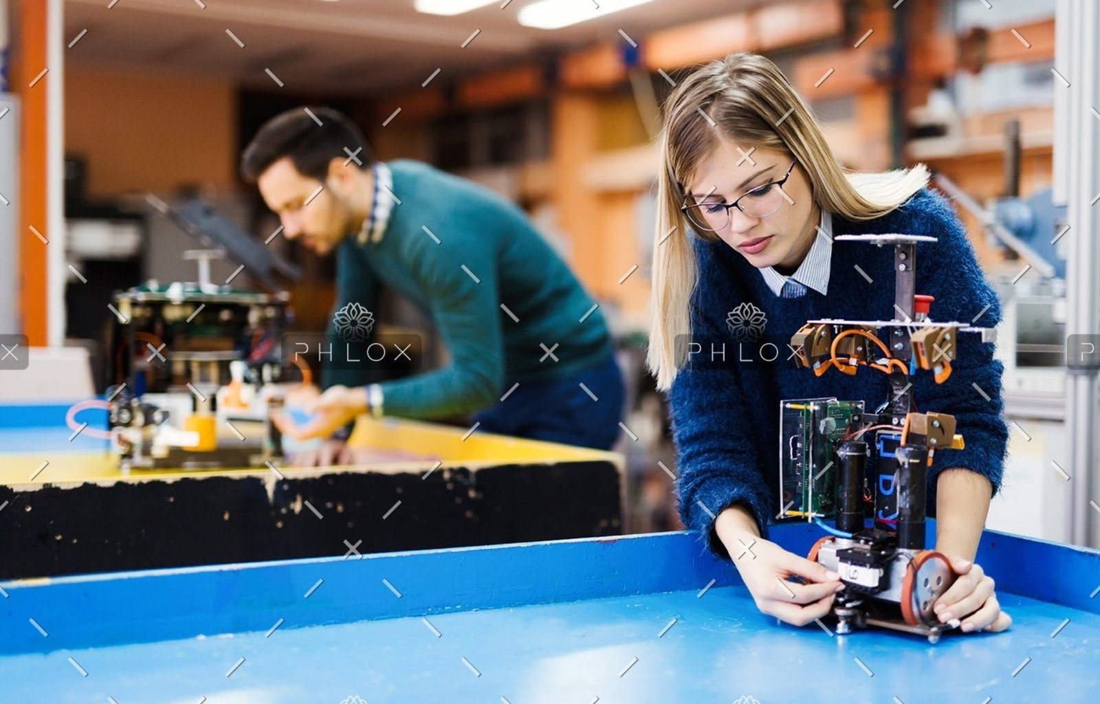 demo-attachment-60-young-student-of-robotics-working-on-project-S32GWUC